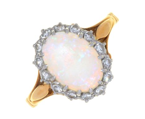 AN OPAL AND DIAMOND CLUSTER RING, GOLD HOOP MARKED 18CT &amp; PLAT, 3G, SIZE K  Opal polish dull from wear, condition otherwi