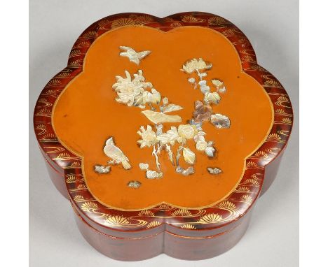 A JAPANESE LACQUER BOX AND COVER, THE COVER APPLIED WITH CARVED AND ENGRAVED MOTHER OF PEARL BIRDS AND FLOWERING PLANTS, 22.5