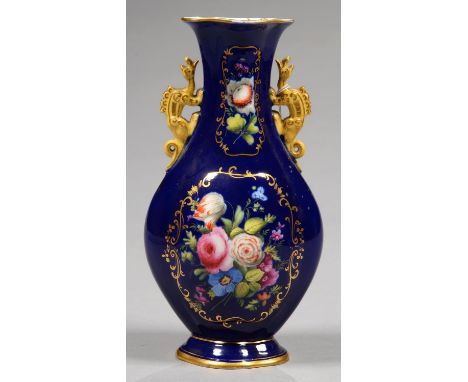 A STAFFORDSHIRE PORCELAIN COBALT GROUND DRAGON HANDLED VASE, PAINTED TO EITHER SIDE WITH TWO GROUPS OF FLOWERS, 24.5CM H, C18