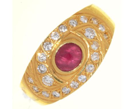 A RUBY AND DIAMOND RING WITH SINGLE CENTRAL RUBY CABOCHON, IN GOLD MARKED 750, 7.1G, SIZE O½  Good condition