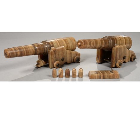 A PAIR OF ALABASTER MODEL CANNON, 19TH C, 31CM L, LATE 19TH C  On one trunnions and back ring re-stuck, both requiring minor 