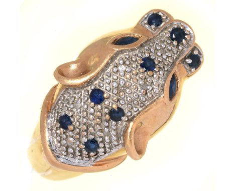 A DIAMOND AND SAPPHIRE BIG CAT RING IN GOLD, UNMARKED, 7.6G, SIZE U½  Slight wear to hoop