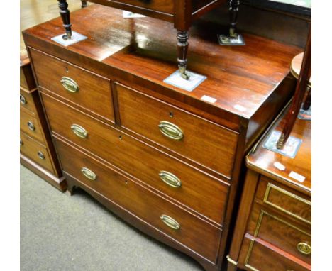 A 19th century three height chest of drawers on swept bracket feet 
