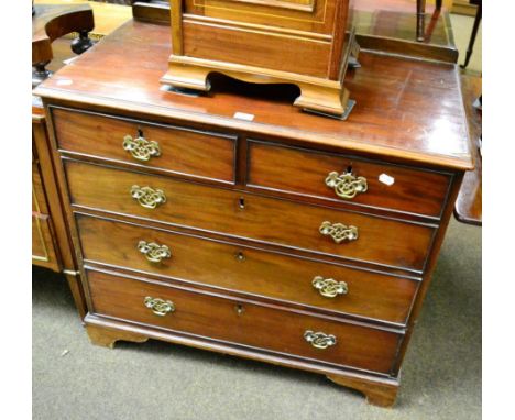 A George III mahogany four height chest of drawers on bracket feet 