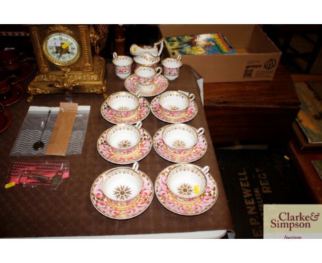 An early 19th Century Spode pink rose decorated tea / coffee set (some cracks)