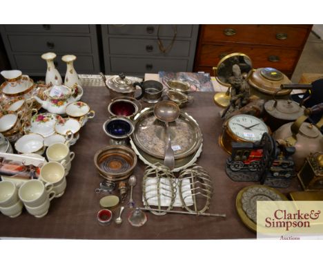 A quantity of various plated ware to include a tea set; ladle; coaster; toast racks etc