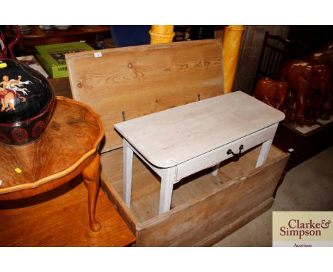 An antique stripped pine trunk