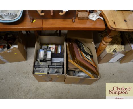 A collection of miscellaneous CDs. various kitchenalia, prints etc contained in two boxes
