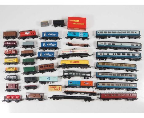 A group of mostly unboxed OO gauge rolling stock by HORNBY, LIMA and others - generally G (unboxed) (Q)