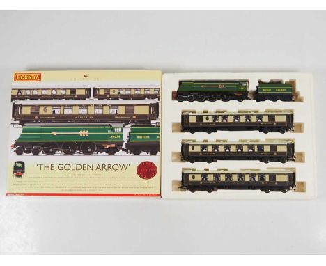 A HORNBY R2369 OO gauge 'The Golden Arrow' train pack comprising a Battle of Britain class steam locomotive and three Pullman