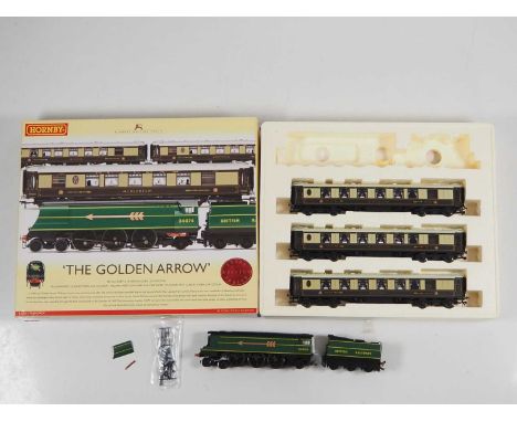 A HORNBY OO gauge R2369 'The Golden Arrow' train pack, one smoke deflector detached from loco but present - VG in VG box