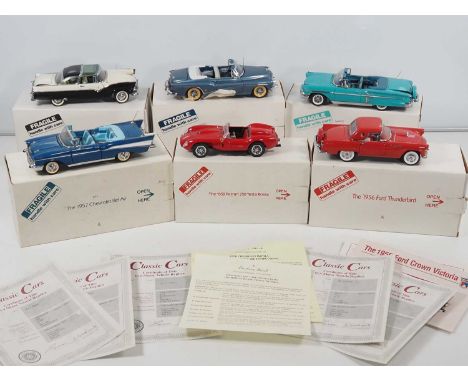 A group of 1:24 scale DANBURY MINT diecast cars to include a 1957 Chevrolet Bel Air and a Ferrari 250 Testa Rossa - with asso