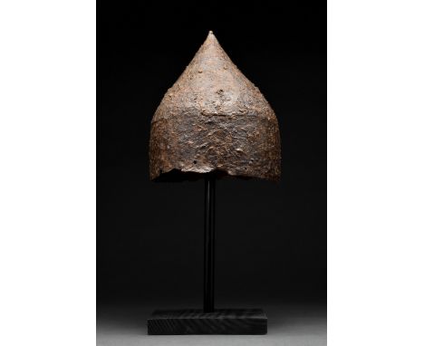 Circa 900-1000 AD Rare Viking period iron helmet; formed of triangular sections; attached with iron rivets passing through th