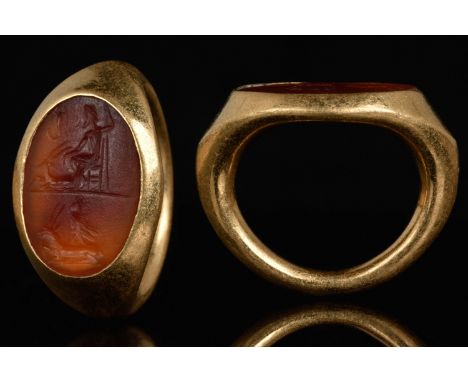 Circa 200-300 ADA gold ring with oval bezel with carnelian intaglio depicting a local deity, most likely of Eastern Greek ori