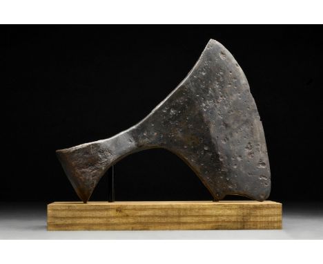 Circa 1000-1100 ADThe broad blade flaring to the curved cutting edge, with eared socket with D-shaped aperture. Commonly refe