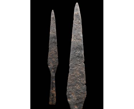 Circa 100-300 ADA Roman socketed leaf-shaped iron spearhead; raised central ridge and integral hollow handle. Lateral holes a
