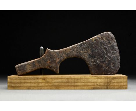 Circa 900-1000 ADAn iron bearded axe head with a heavy blade, a lentoid shoulder and a round socket.The bearded axe, was comm