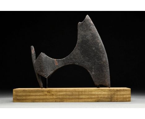 Circa 900-1000 ADA hand-forged iron axe head with substantial curved blade and elliptical shaft-hole. The profile is square a