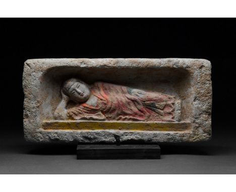 Circa 386-534 ADA finely moulded Chinese grey pottery tile, featuring the depiction of a reclining Buddha. The brick features