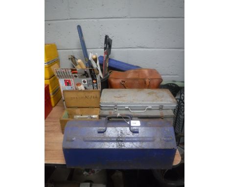 A leather bag, three metal cases and a bucket containing vintage hand tools, copper blow lamps, paint stripper, etc 
