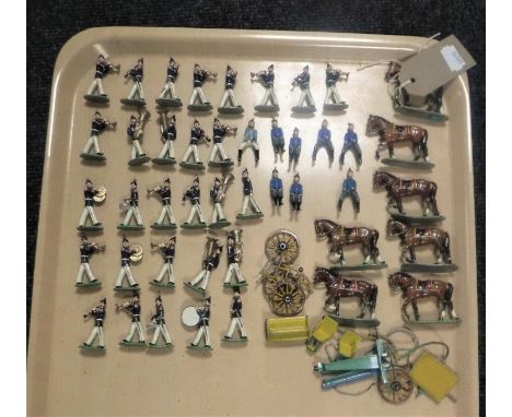 A tray containing a collection of vintage hand-painted lead military figures including bandsmen, cavalry etc