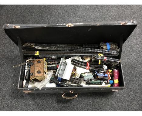 A vintage case containing part Hornby Midnight Freight train set, assorted rolling stock, track and accessories 
