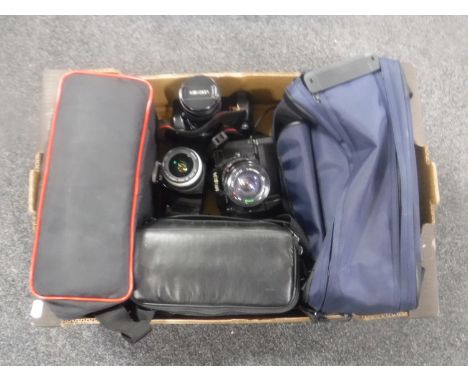 A box of JVC, Sony &amp; Chinon video cameras, three Minolta cameras with lenses, 9000 AF, Dynax 5000 I and Dynax 7000 I 