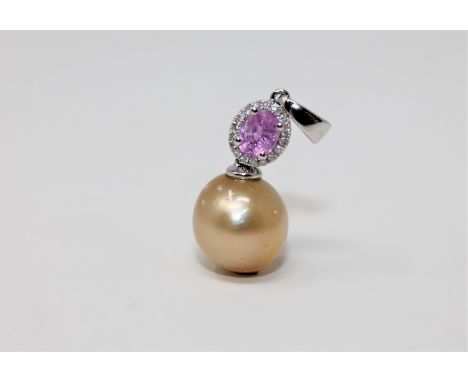 A pearl and pink sapphire pendant, featuring one cultured Tahitian pearl with oval cut pink natural sapphire 0.5ct &amp; 18 r