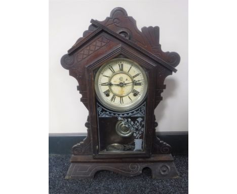 An American eight day striking mantel clock signed The Waterbury Clock Company