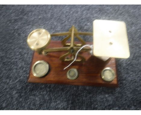 A set of brass postal scales 