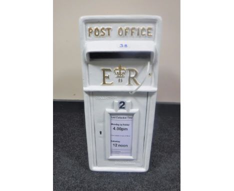 A cast metal "Royal Mail" post box with key 