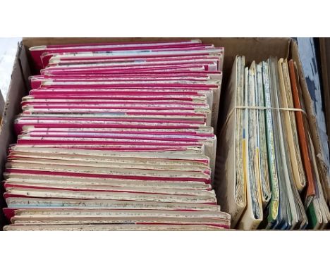 A box containing a vast collection of Ordnance Survey Maps of the British Isles