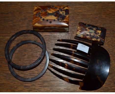 A collection of tortoiseshell items, Includes two bangles, a hair comb and two small boxes&nbsp;