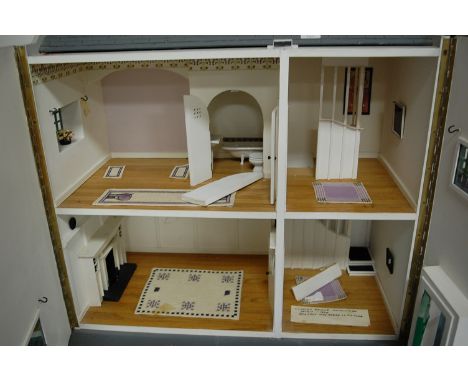 A 1:12" scale two-storey dolls house in the manner of Charles Rennie Mackintosh 