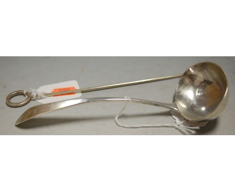 A small 19th century white metal ladle; together with a white metal meat skewer (2) 
