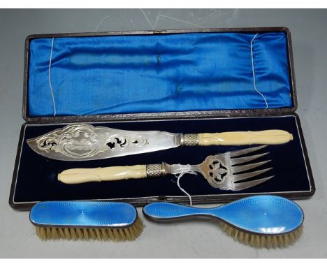 A Victorian silver plated and ivory handled pair of fish servers in fitted case together with a child's silver and enamel two