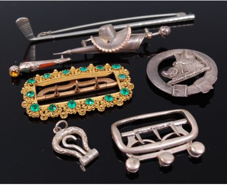 Assorted brooches, principally in silver also to include child's silver belt buckle, miniature silver button hook, pendant et