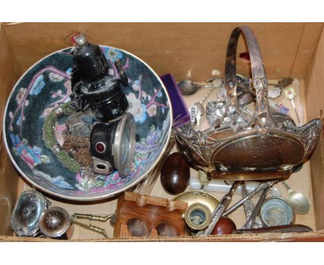 A box of miscellaneous items, to include; early 20th century silver plated basket, loose flatwares, early 20th century bicycl