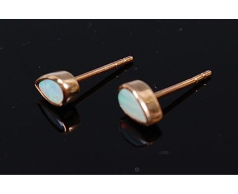 A pair of yellow metal opal set ear studs