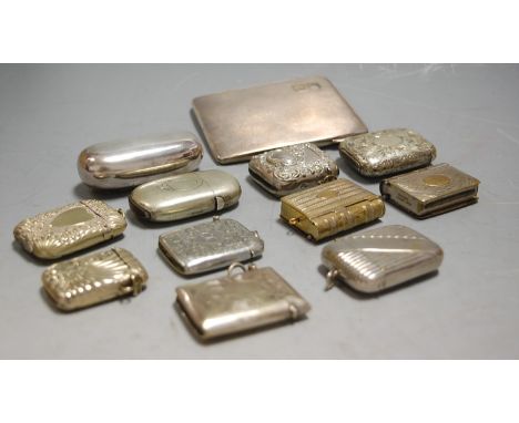 A late Victorian brass novelty stamp holder / vesta case, in the form of a book; a silver plated pocket snuff-box; and a silv