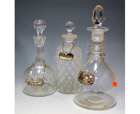 Three various 19th century glass decanters to include large triple ring neck mallet example, together with early 19th century