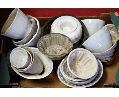 A box of miscellaneous 19th century and later ceramic jelly moulds 
