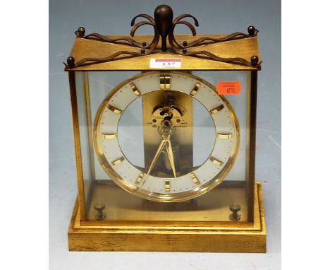 A 20th century lacquered brass four glass mantel clock, by Junghans, having seven jewel anti-climatic electronic movement, h.