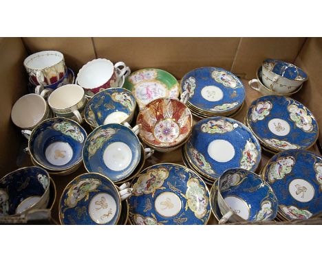 A New Chelsea Staffordshire part tea service on a blue ground with gilt decoration retailed by Thomas Goode of London togethe