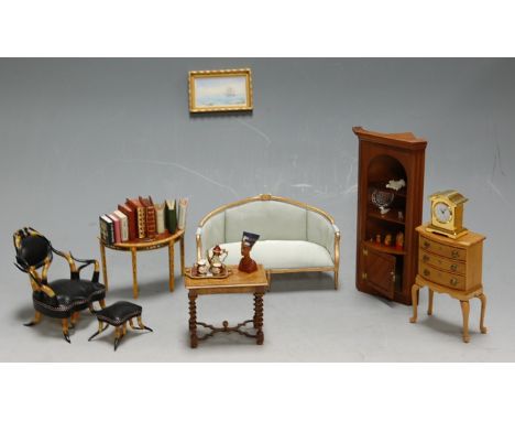 A collection of good quality dolls house furniture, to include; model of a William & Mary walnut side table, antler chair and