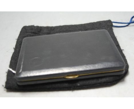 A Dunhill black leather clad and brass pocket cigarette case 