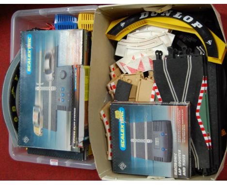 A boxed Scalextric Pacer System together with a boxed PowerPlus System, an electronic lap counter and timer and various loose