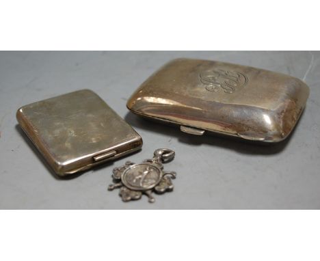 A George V silver matchbook holder, maker Horace Woodward & Co Ltd, Birmingham 1921; together with a George V silver pocket c