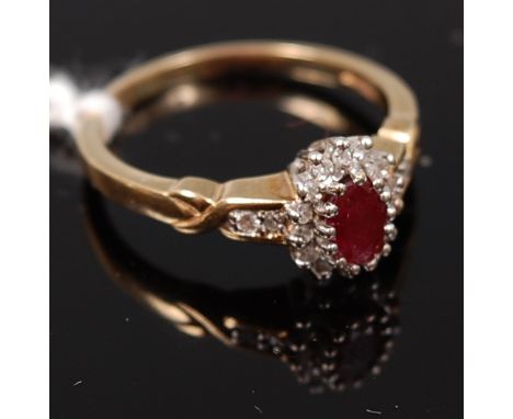 A 9ct gold, ruby and diamond point set cluster ring, 3.1g, size Q