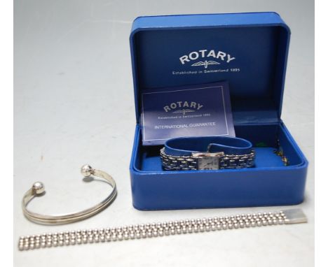 A ladies Rotary steel cased wristwatch having a mother of pearl dial with Roman numerals on bracelet strap, boxed, together w